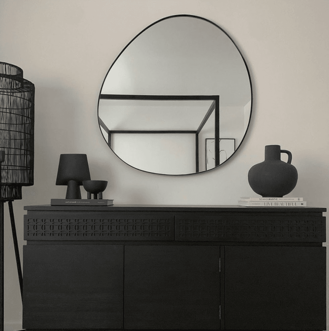 Irregular circular mirrors with frame